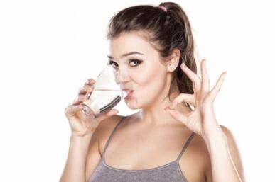 A girl drink clean water